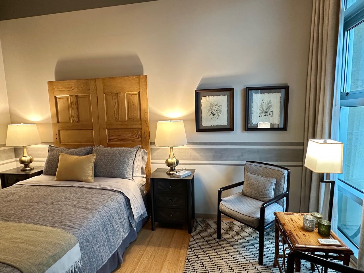 Nashville Gulch — After, bedroom with reclaimed door headboard and botanical prints