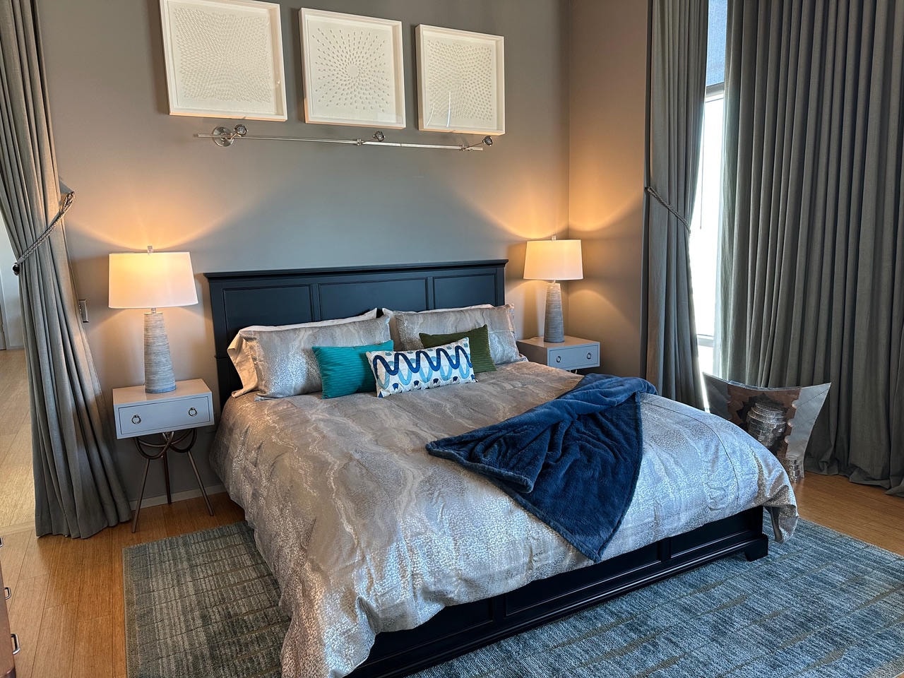 Nashville Gulch — After, master bedroom with black headboard and three white sculptural art panels