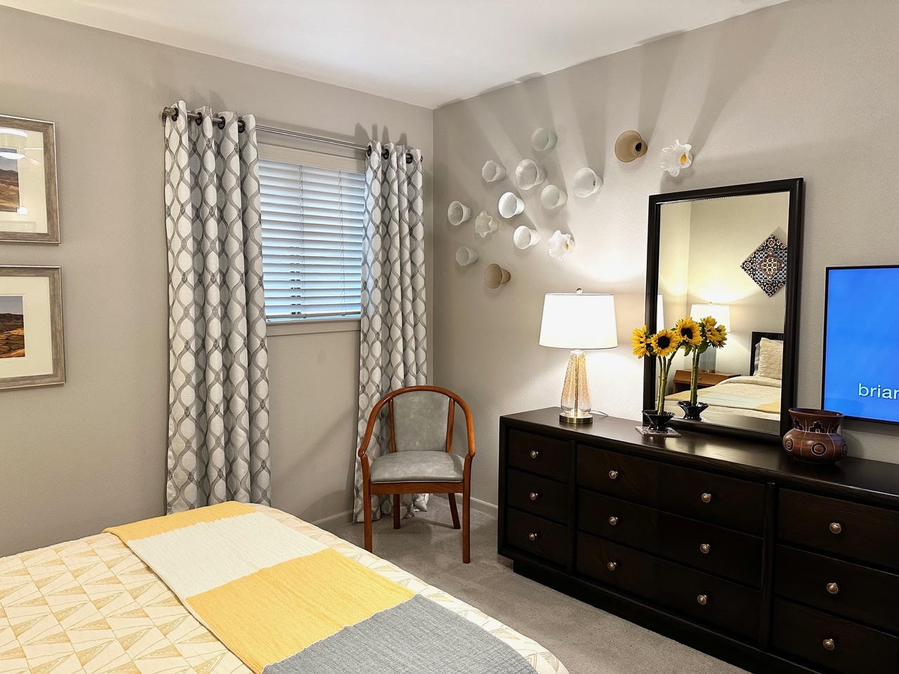 Austin Rock — After, bedroom dresser with decorative wall art