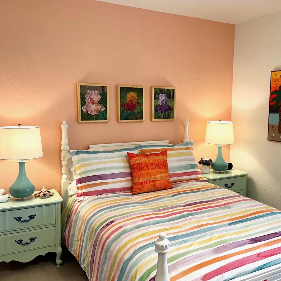 Austin Trail — After, child's bedroom with rainbow striped bedding, iris paintings and teal lamps