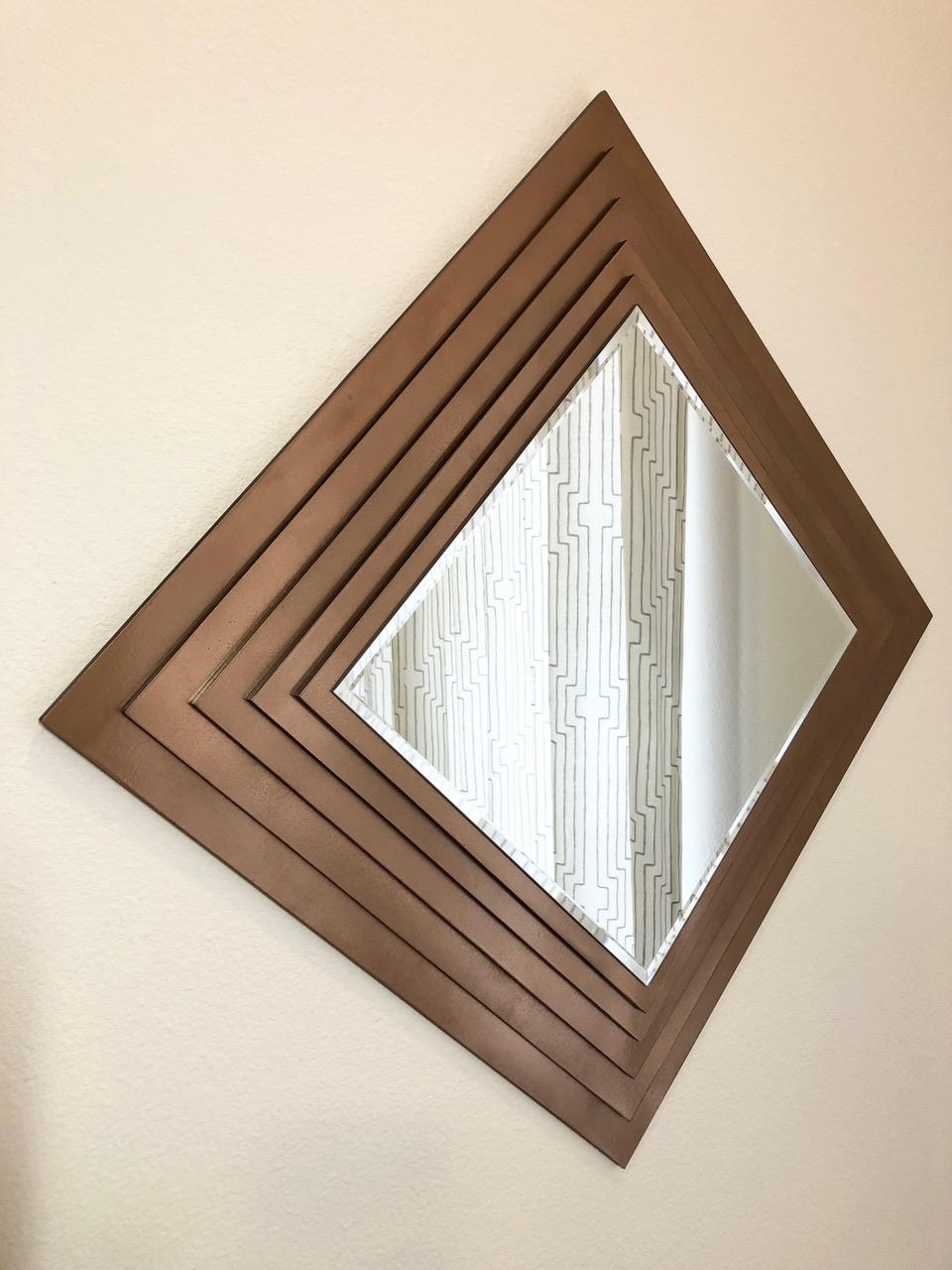 Diamond mirror with stepped walnut brown wooden frame