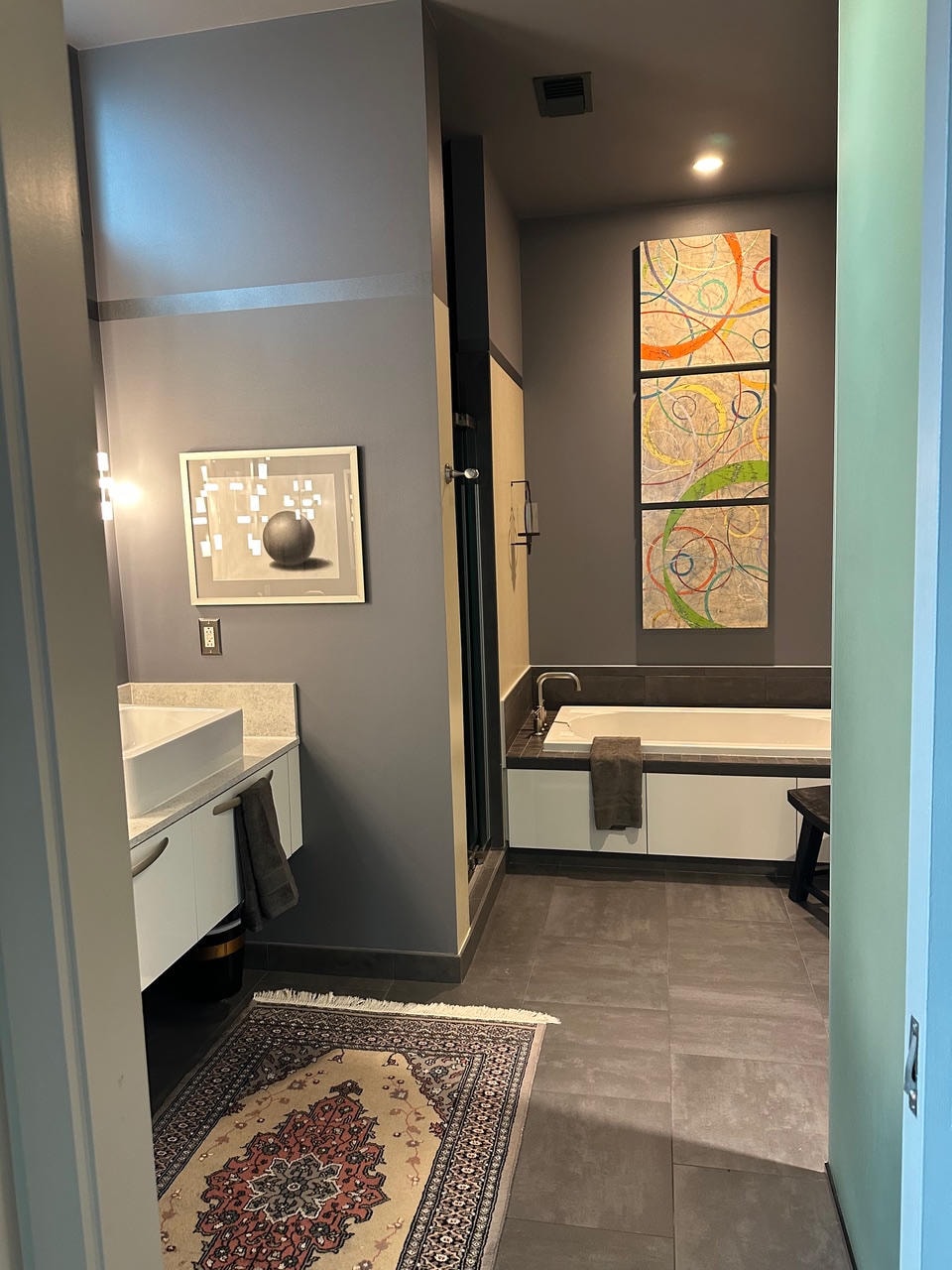 Nashville Gulch — After, bathroom with soaking tub and colorful artwork