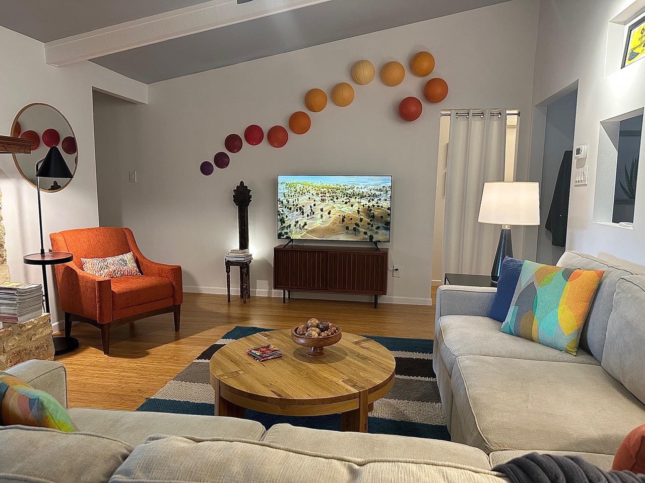 Austin Rock — After, living room with orange chair